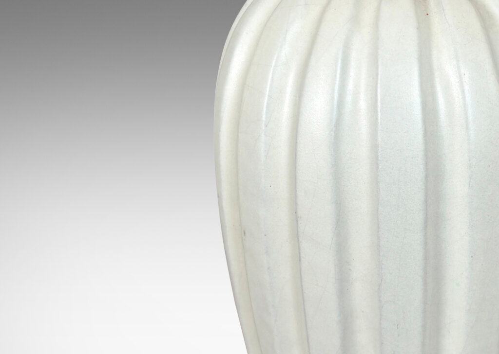 Gallery BAC vertically fluted bulbous form in an eggshell finish ivory glaze