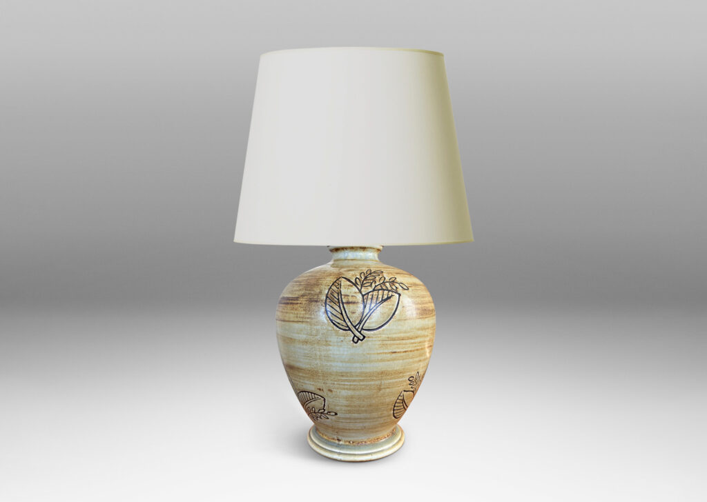 Gallery BAC traditional tapering form with plinth base and carved leafy motifs, glazed in a woodgrain-evoking matte striae brown over gold