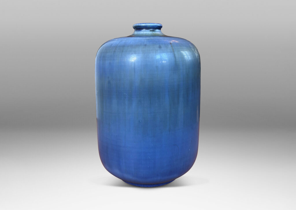 Gallery BAC straight-sided ovoid form with small flared mouth, glazed in a dark cornflower blue