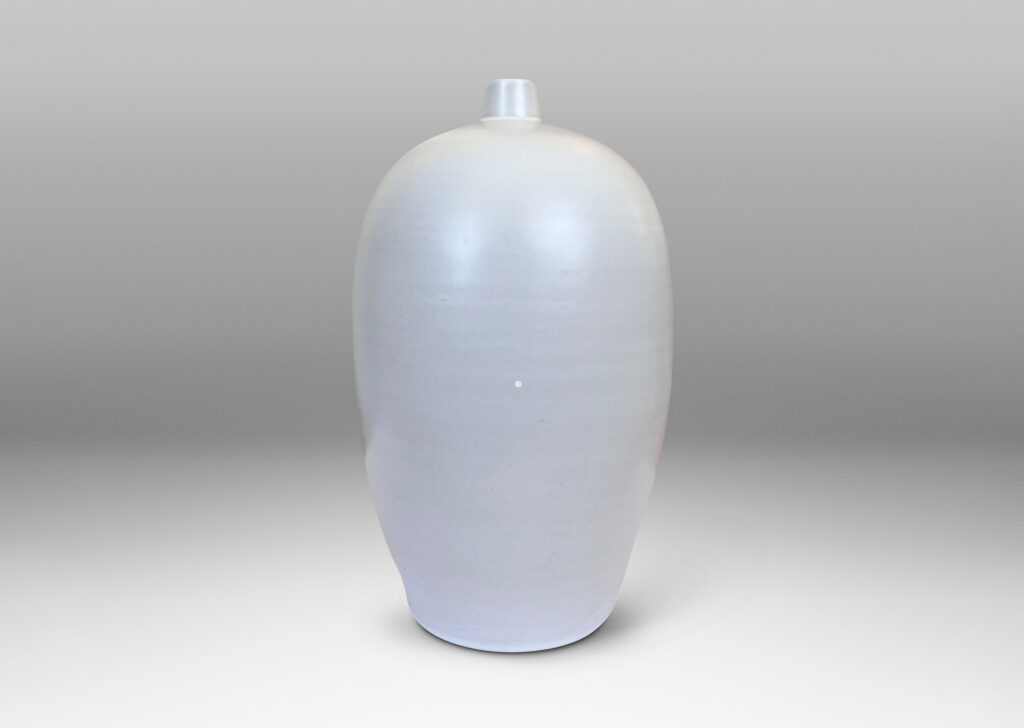 Gallery BAC balloon-like form with small spout mouth, glazed in an eggshell pale gray-tinted off-white