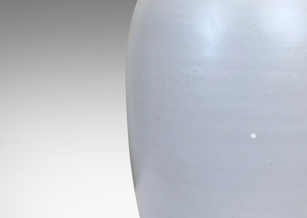 Gallery BAC balloon-like form with small spout mouth, glazed in an eggshell pale gray-tinted off-white