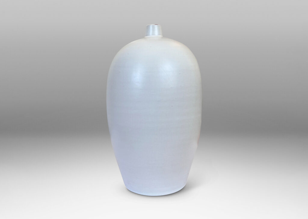 Gallery BAC balloon-like form with small spout mouth, glazed in an eggshell pale gray-tinted off-white