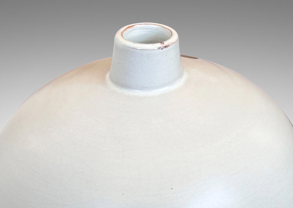 Gallery BAC balloon-like form with small spout mouth, glazed in an eggshell pale gray-tinted off-white