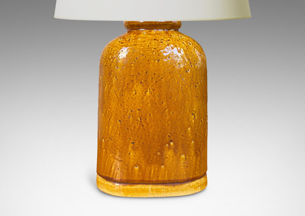 Gallery BAC rounded-shoulder flask form with grog texture and deep honey glaze