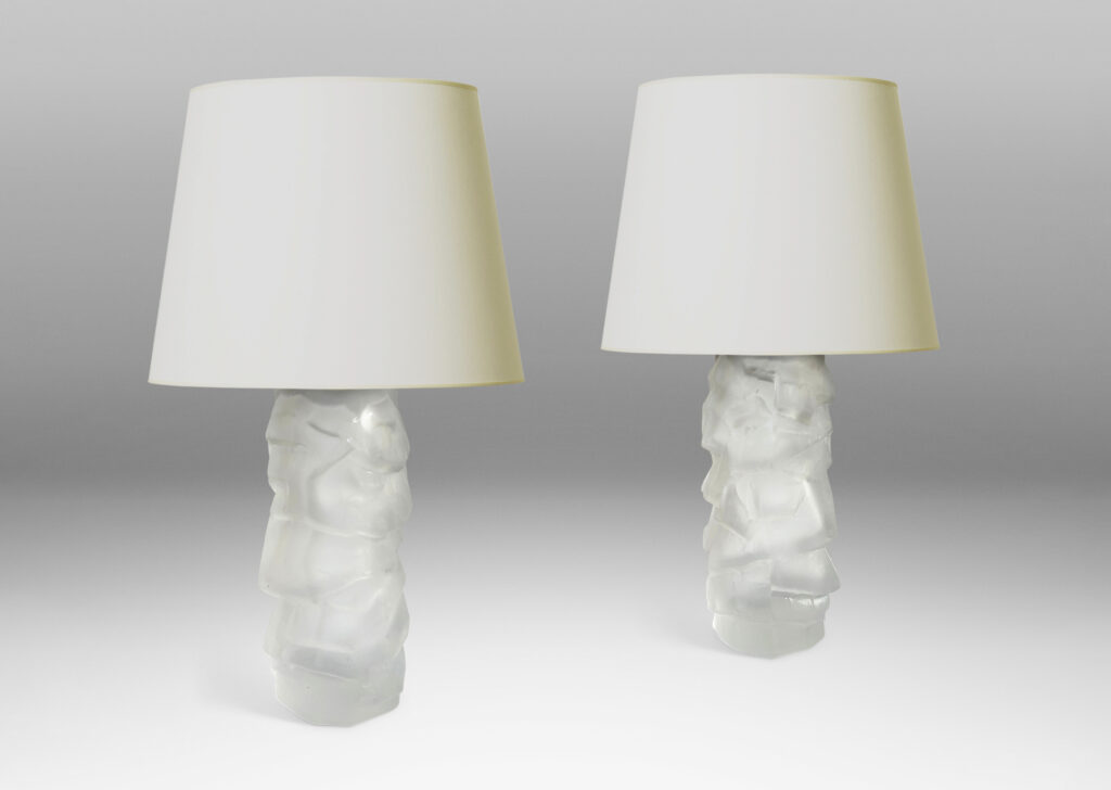 Gallery BAC cylindrical bases mold-blown with a rock-like relief, sandblasted glass with steel mounts