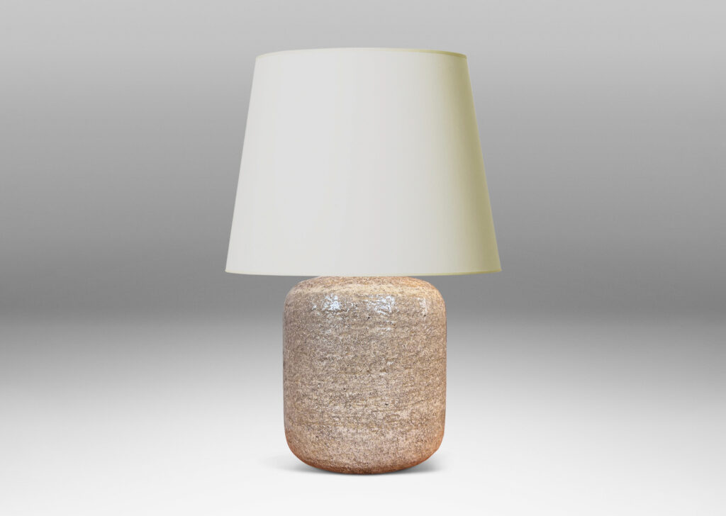 Gallery BAC rounded cylindrical form with textured surfacing, glazed in a pale sand tone with thin gray wash