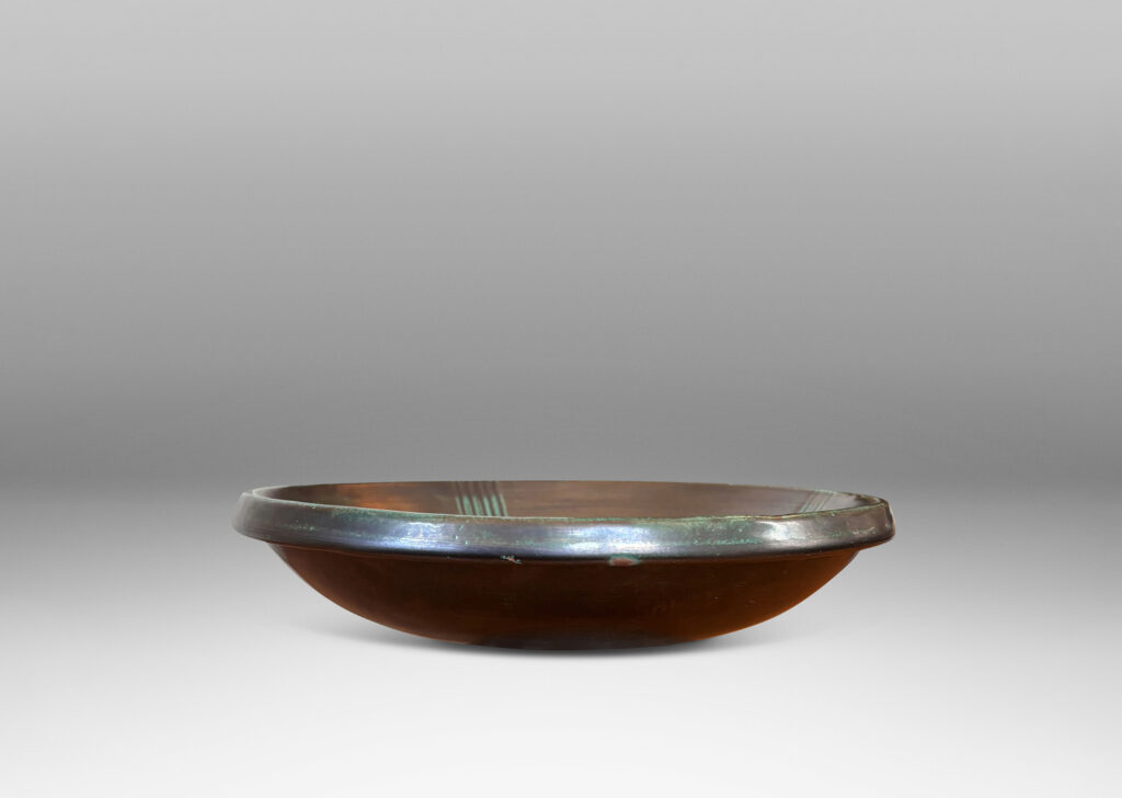 Gallery BAC gently curved sides and relief striated geometric designs; tonal teal green copper oxide glazing