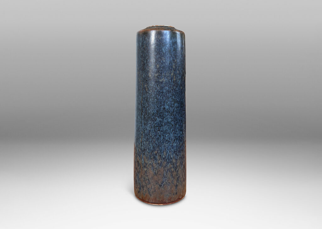 Gallery BAC tall cylindrical form with flush mouth, glazed in black-dark gray and brown