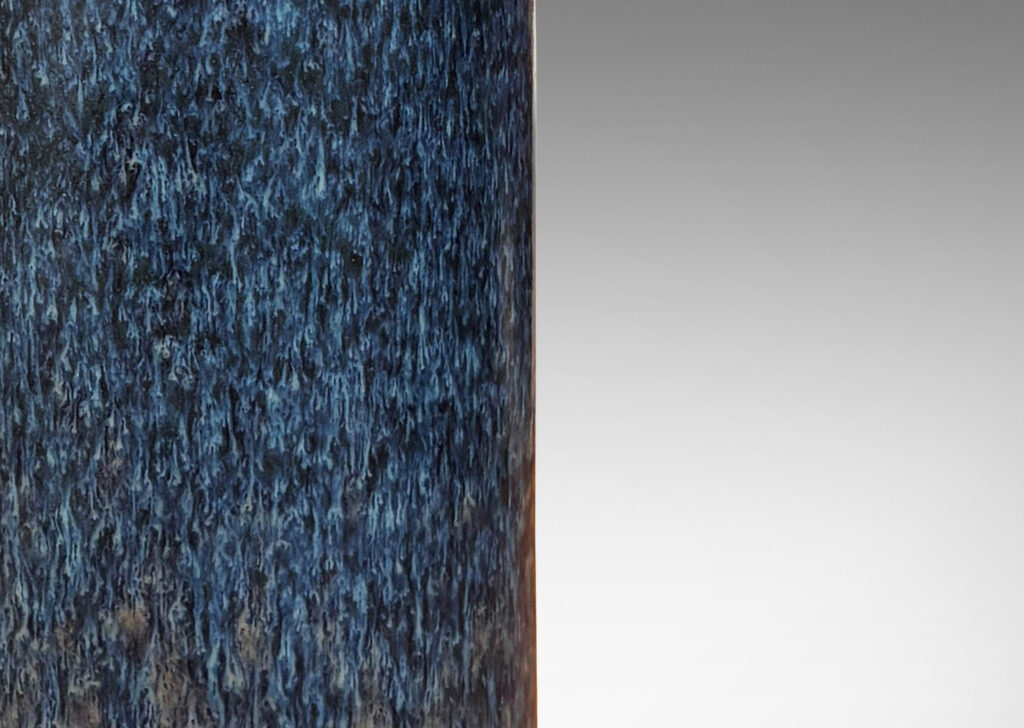 Gallery BAC tall cylindrical form with flush mouth, glazed in black-dark gray and brown