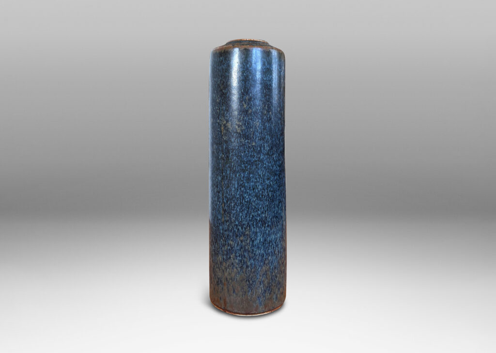 Gallery BAC tall cylindrical form with flush mouth, glazed in black-dark gray and brown