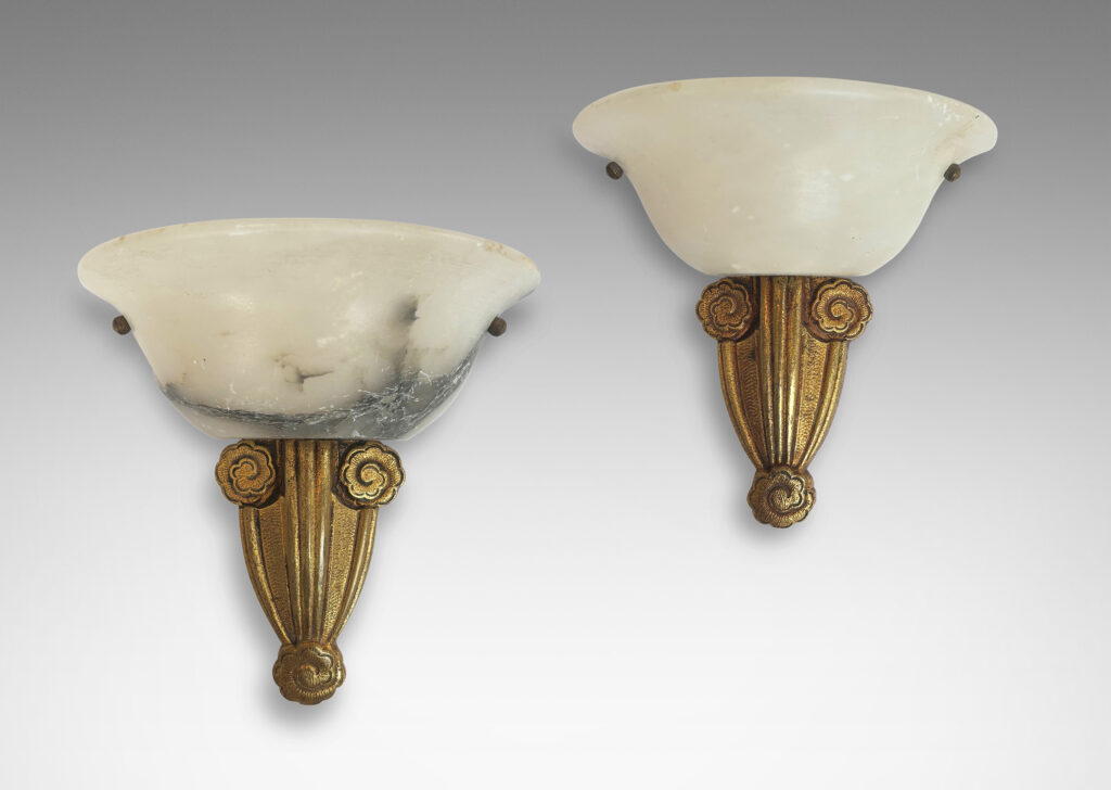 Gallery BAC mounts ornamented with stylized flora and bell-form shades; gilded metal and alabaster