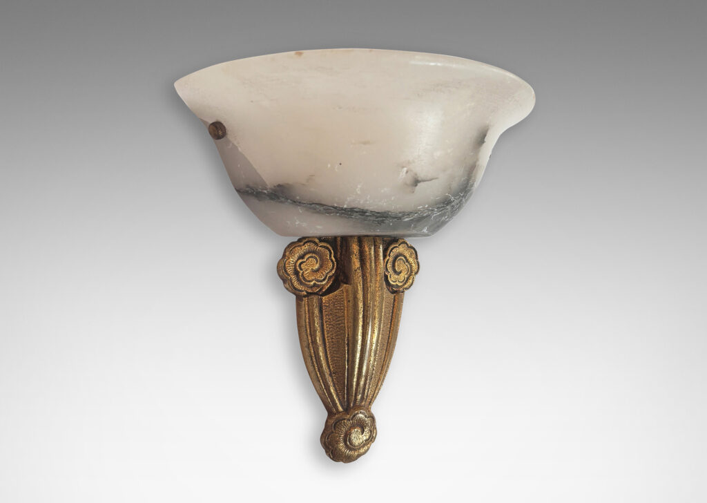 Gallery BAC mounts ornamented with stylized flora and bell-form shades; gilded metal and alabaster