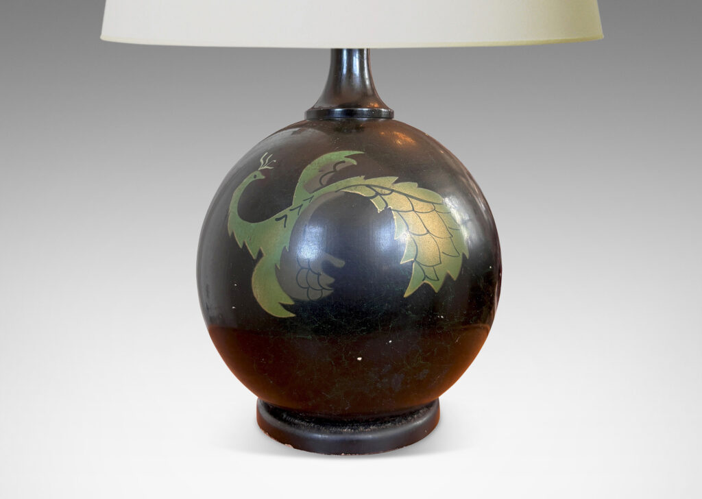Gallery BAC globe form with a painted black finish with floating phoenix motifs in green tones; wood