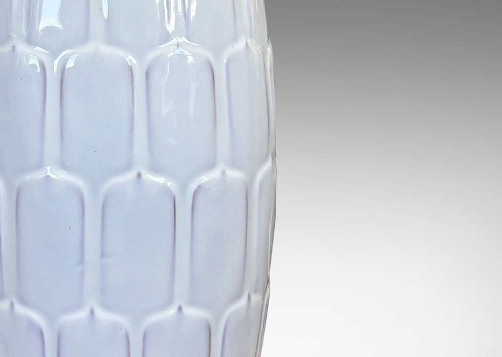 Gallery BAC large swelling form with pinecone-like scale pattern in relief, glazed in a glossy white