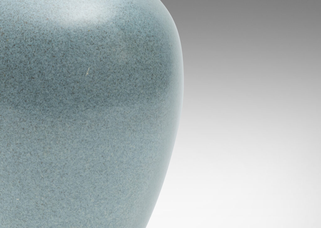 Gallery BAC tapered form with spouting mouth, glazed in a speckled light blue glaze