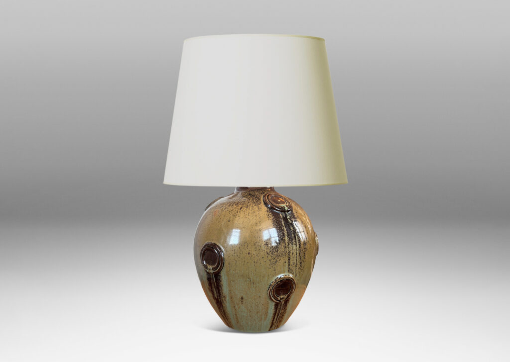 Gallery BAC balloon form with floating circular motifs in relief, glazed in olive green and brown tones