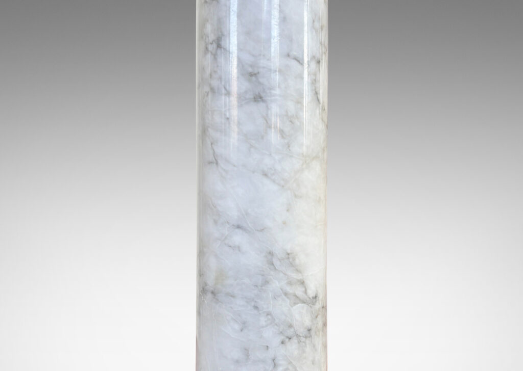 Gallery BAC slender cylindrical forms with bases articulated with relief rings, in cool white with gray veining