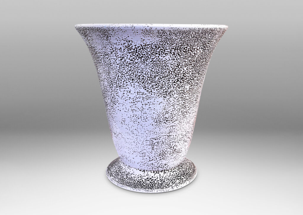Gallery BAC lyre-silhouetted vase form on a flanged foot, glazed in white “crispé” glaze over matte brown