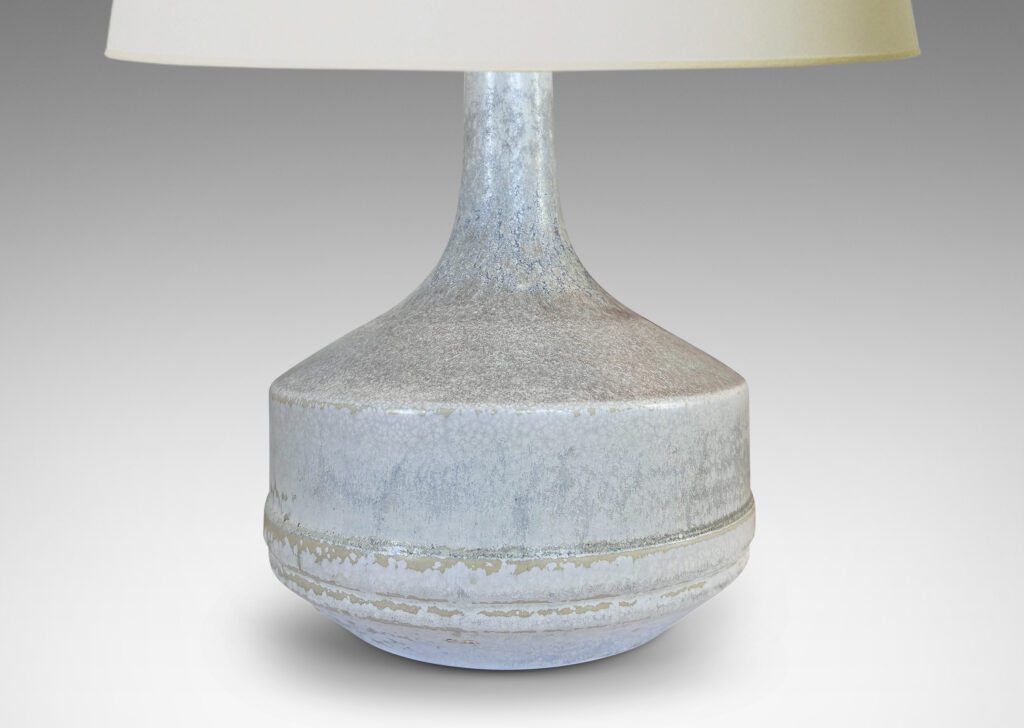 Gallery BAC low drum forms with sprouting tall necks, glazed in mottled very pale gray