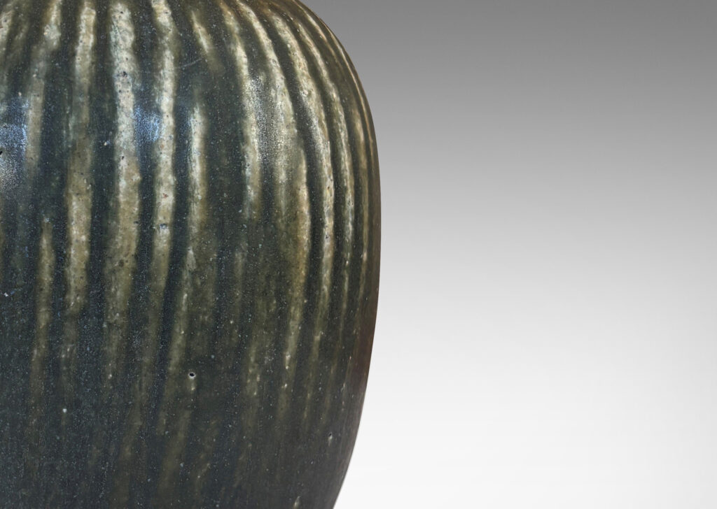 Gallery BAC ovoid form with vertical reeding, glazed in a matte green-gray