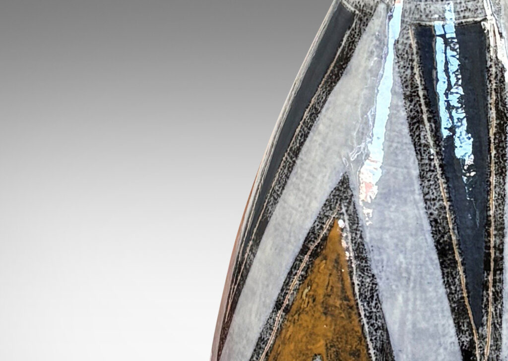 Gallery BAC carafe-like form with bulbous body and flared neck, glazed white with golden yellow, gray-blue, and black