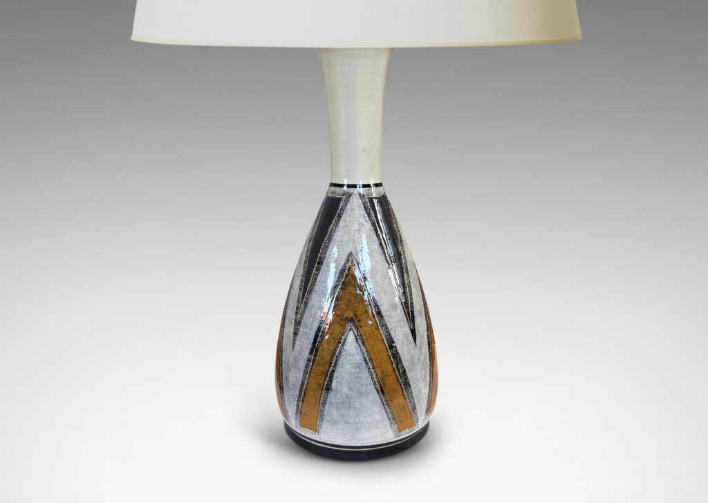 Gallery BAC carafe-like form with bulbous body and flared neck, glazed white with golden yellow, gray-blue, and black