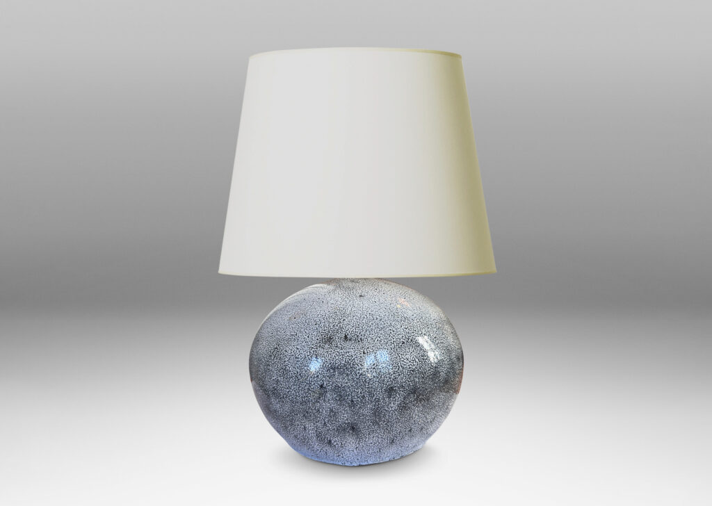 Gallery BAC wide globe form in white with dark gray stipple-glazed earthenware