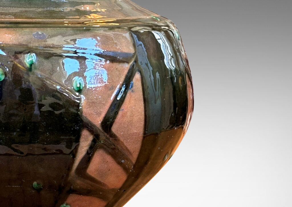 Gallery BAC wide tapered form with large mouth, glazed in orange-brown with dark brown and green piped ornamentation