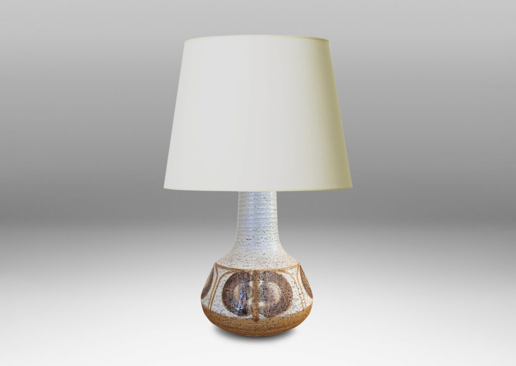 Gallery BAC ridged decanter-like form, glazed in a pale gray with painted geometric ornaments in light and dark brown