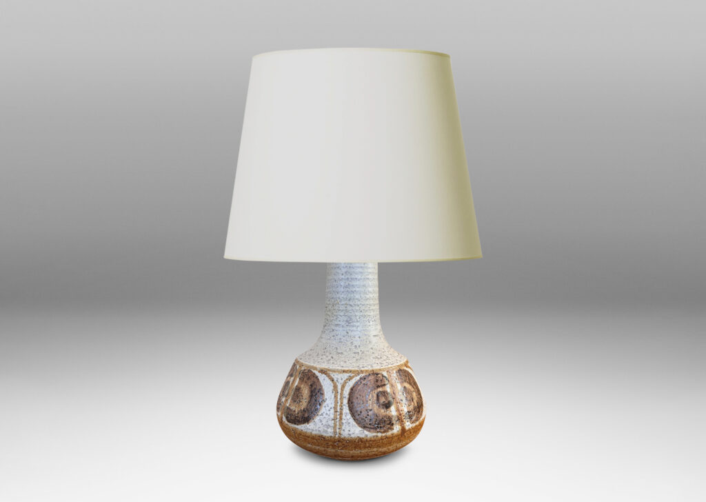 Gallery BAC ridged decanter-like form, glazed in a pale gray with painted geometric ornaments in light and dark brown