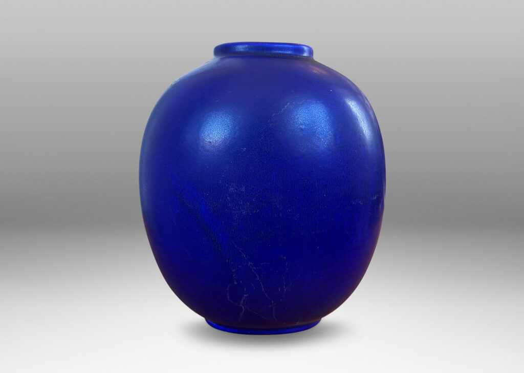 Gallery BAC compressed upright round form glazed in a saturated ultramarine blue