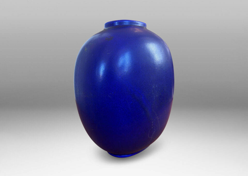 Gallery BAC compressed upright round form glazed in a saturated ultramarine blue