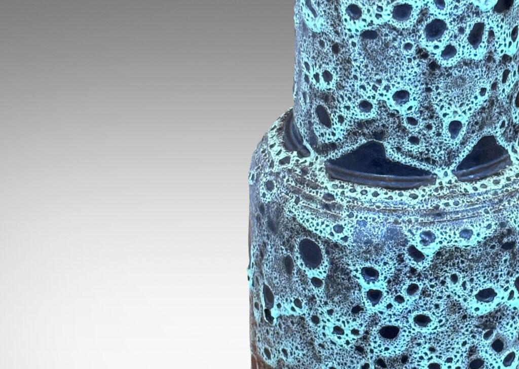 Gallery BAC tall tiered bell form, glazed in a lava-like frothy celadon-black