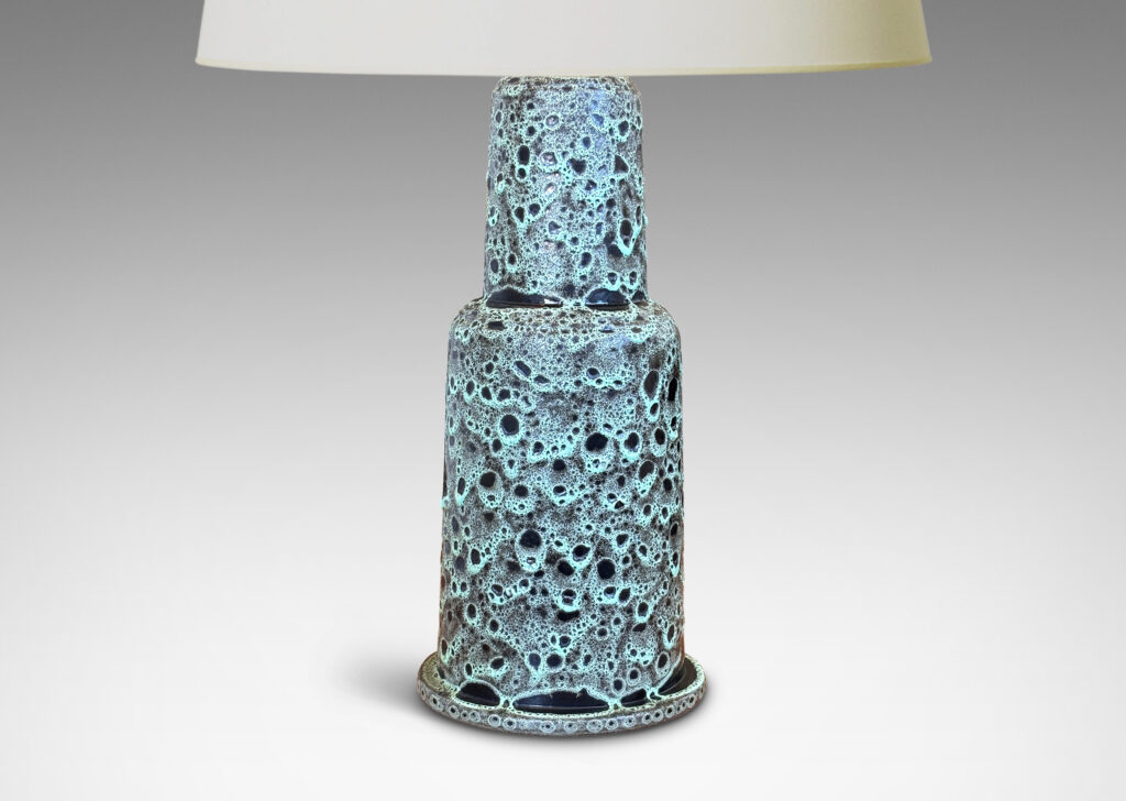Gallery BAC tall tiered bell form, glazed in a lava-like frothy celadon-black