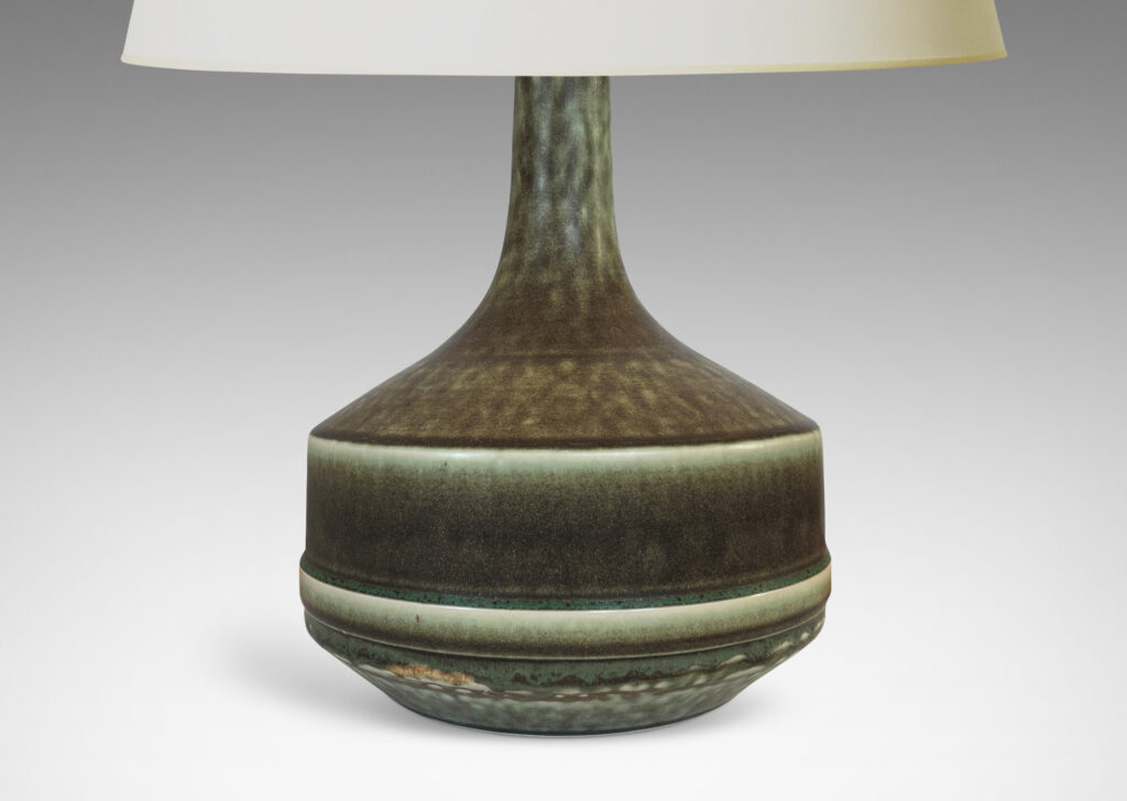 Gallery BAC low drum form with sprouting tall necks, glazed in a velvety dark green