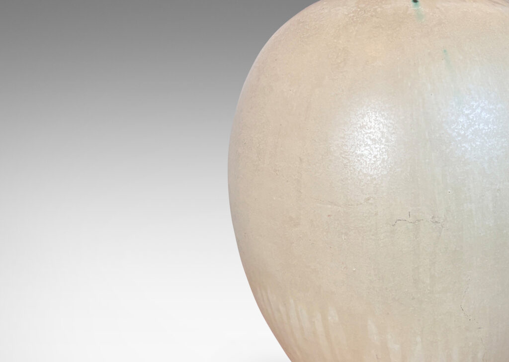 Gallery BAC ovoid form with conical spout mouth, glazed in a matte ivory-tan