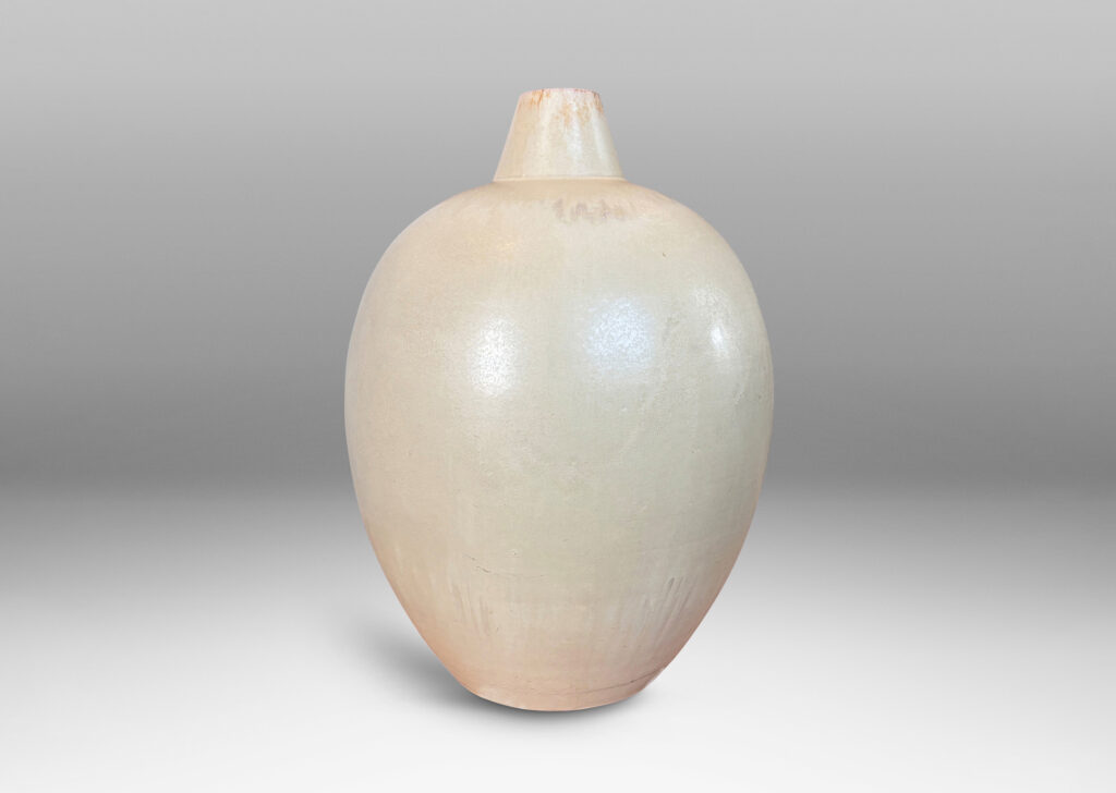 Gallery BAC ovoid form with conical spout mouth, glazed in a matte ivory-tan
