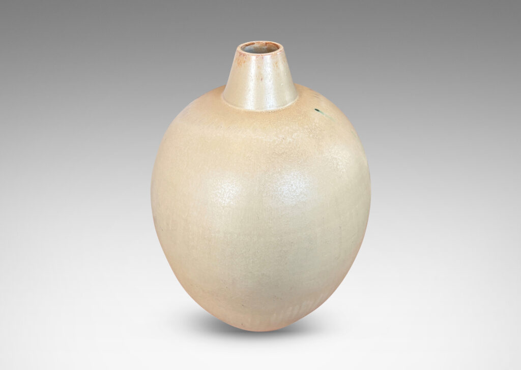Gallery BAC ovoid form with conical spout mouth, glazed in a matte ivory-tan