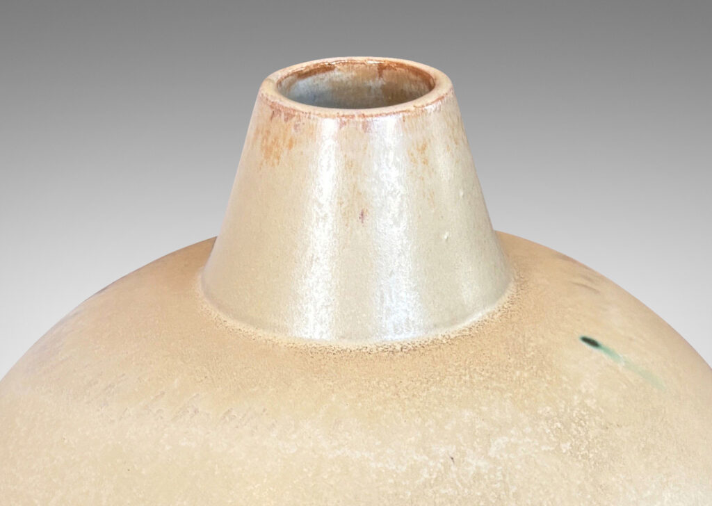 Gallery BAC ovoid form with conical spout mouth, glazed in a matte ivory-tan