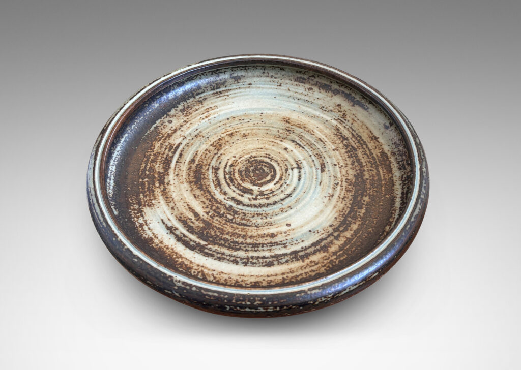 Gallery BAC low organically modeled curving sides and a handsome brown and pale gray “Sung” glaze