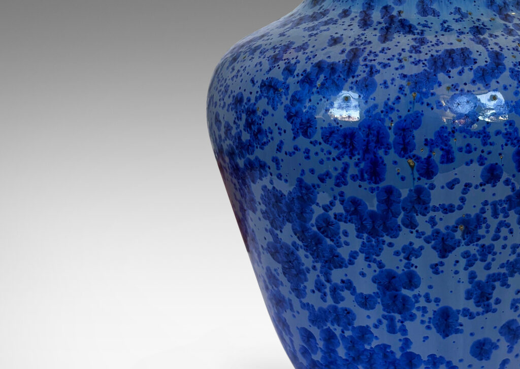 Gallery BAC tapered form with wide mouth, glazed in pale blue with cornflower blue dappling