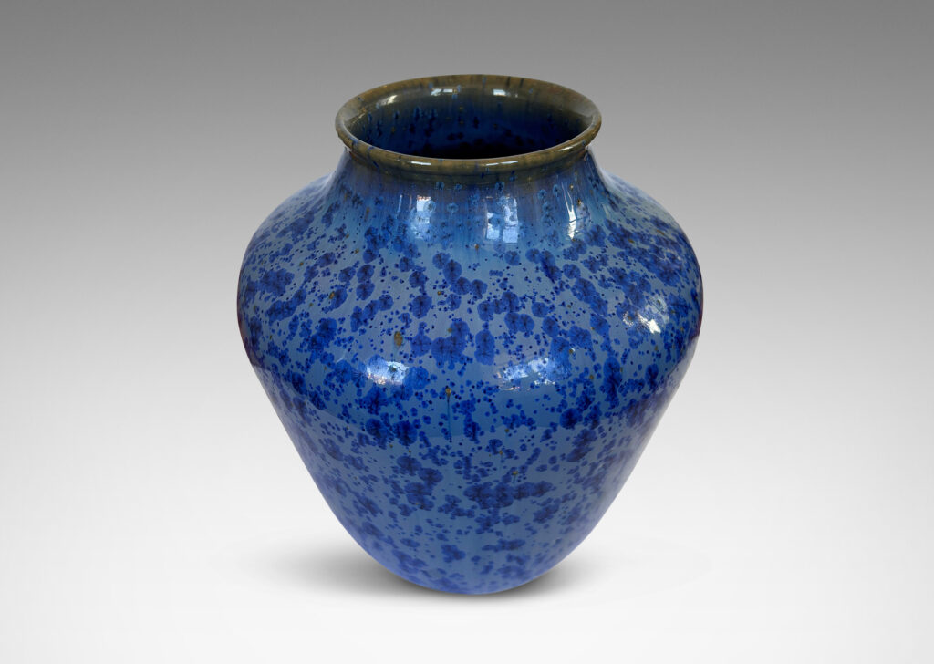 Gallery BAC tapered form with wide mouth, glazed in pale blue with cornflower blue dappling