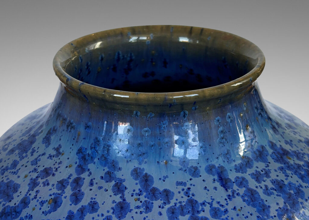 Gallery BAC tapered form with wide mouth, glazed in pale blue with cornflower blue dappling