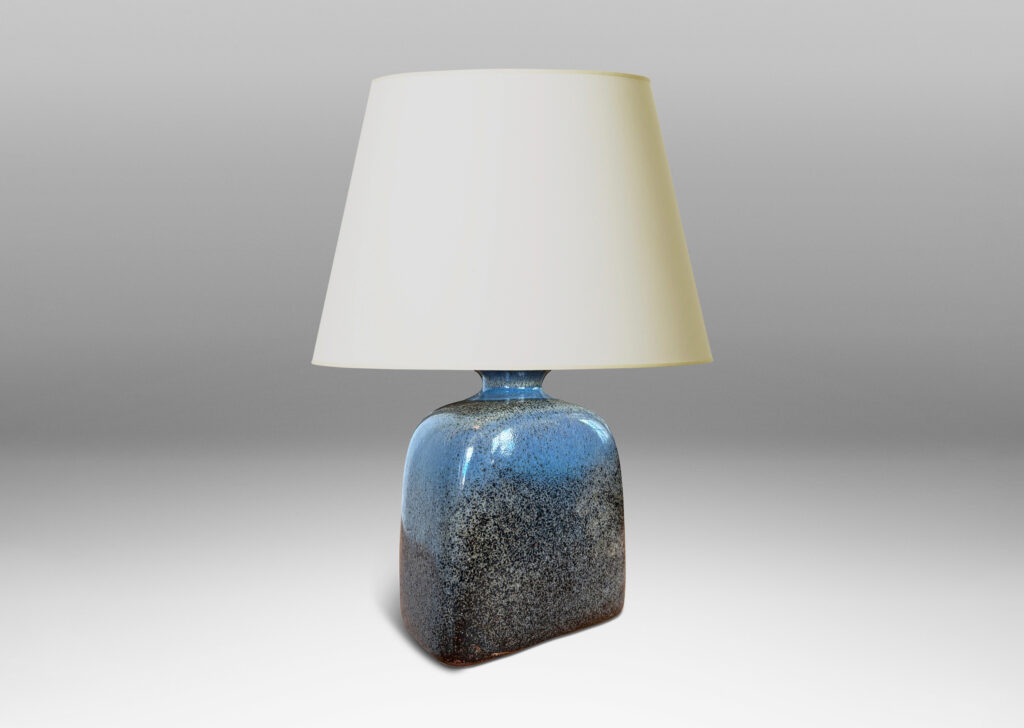 Gallery BAC bottle-like form with sloped shoulders and flanged cap, glazed in a grayish-blue with darker tone speckles