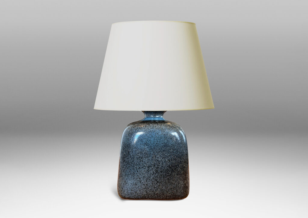 Gallery BAC bottle-like form with sloped shoulders and flanged cap, glazed in a grayish-blue with darker tone speckles