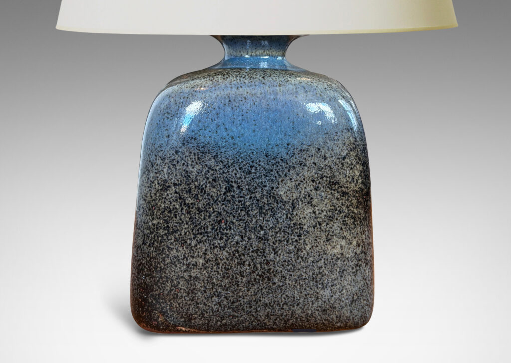 Gallery BAC bottle-like form with sloped shoulders and flanged cap, glazed in a grayish-blue with darker tone speckles