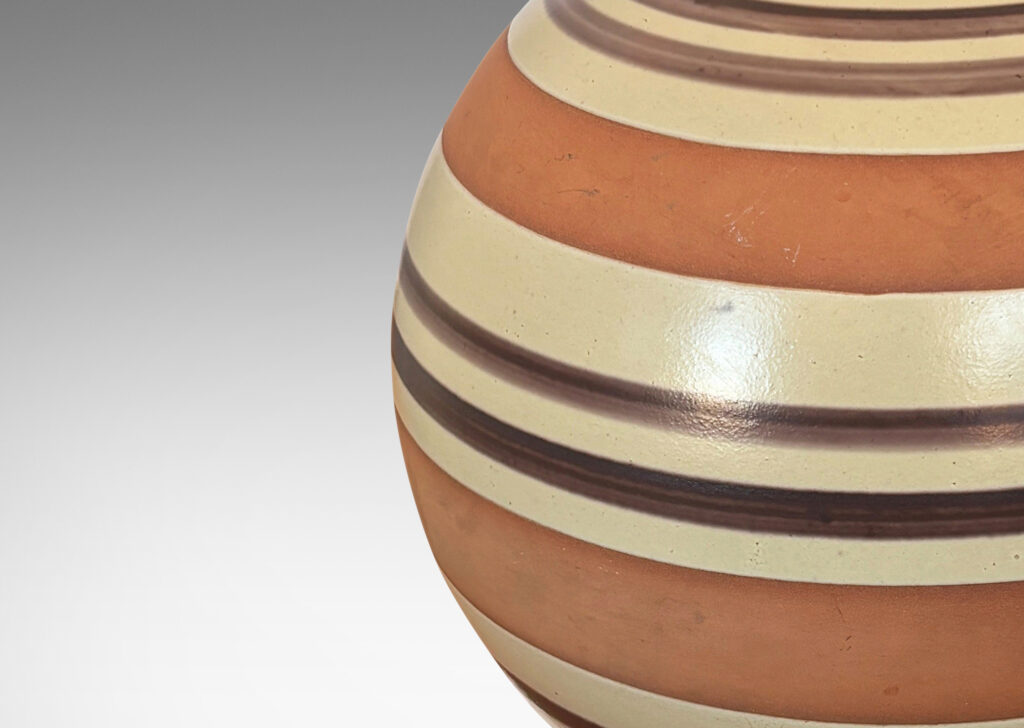 Gallery BAC spherical form partially glazed in pale tan-gray with brown stripes and broad unglazed bands