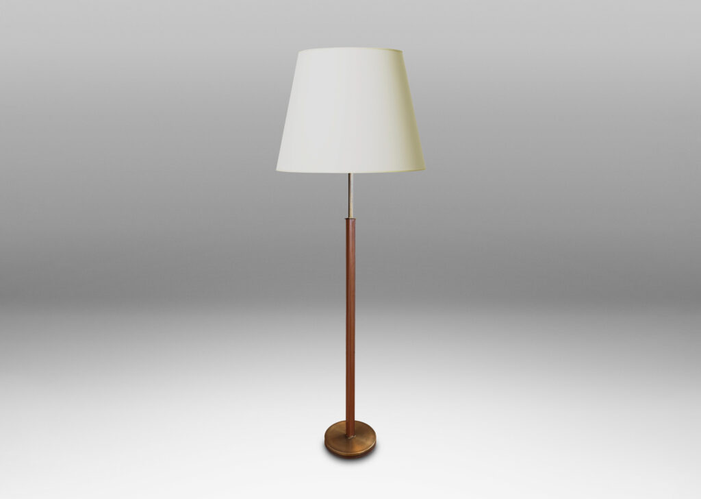 Gallery BAC square stand partially covered in stitched tan leather on a disk base