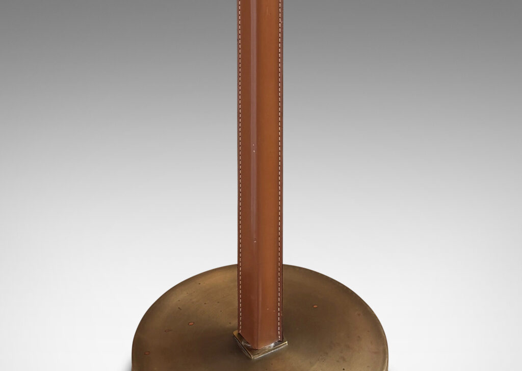 Gallery BAC square stand partially covered in stitched tan leather on a disk base