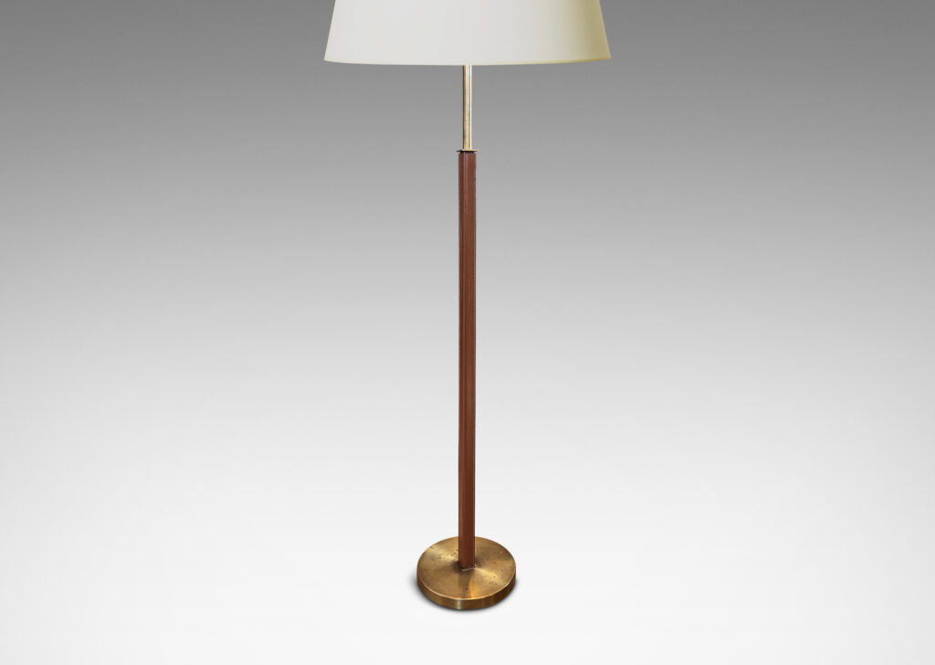 Gallery BAC square stand partially covered in stitched tan leather on a disk base